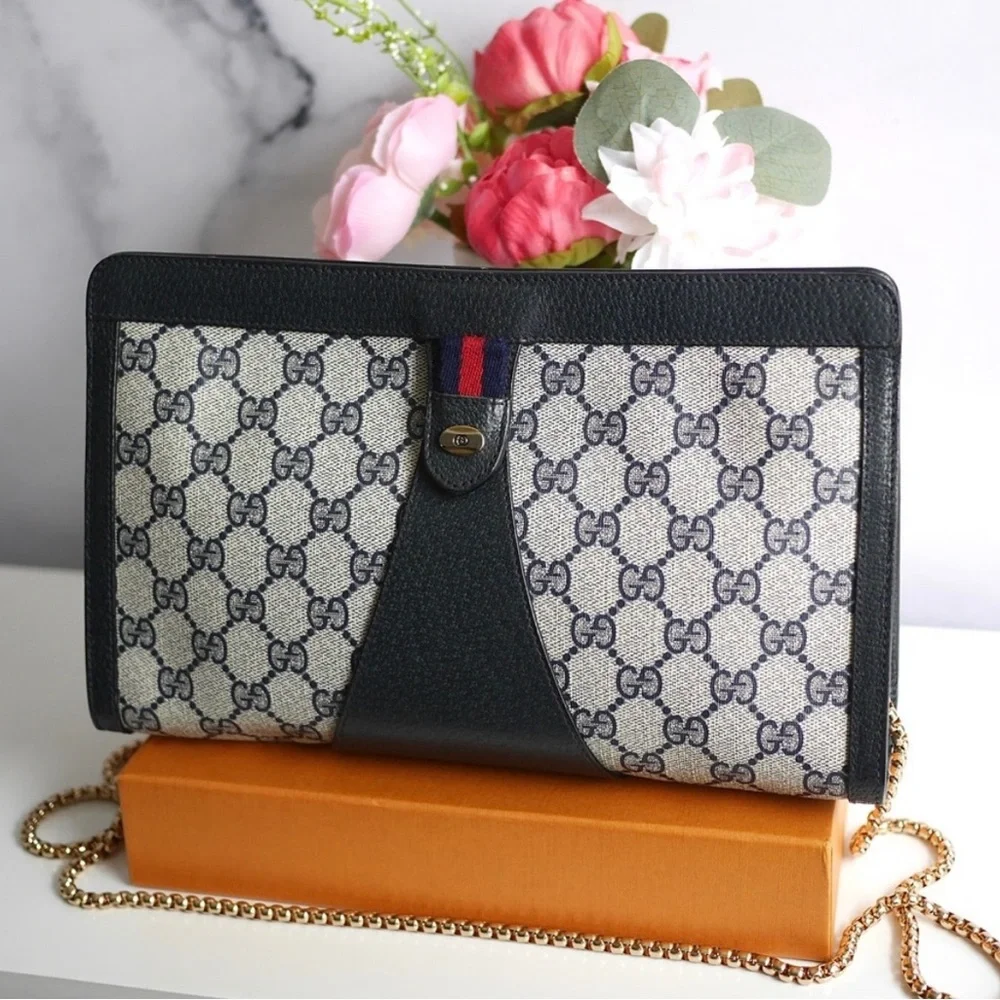 Gucci Beige Navy Monogram Canvas Leather Clutch
